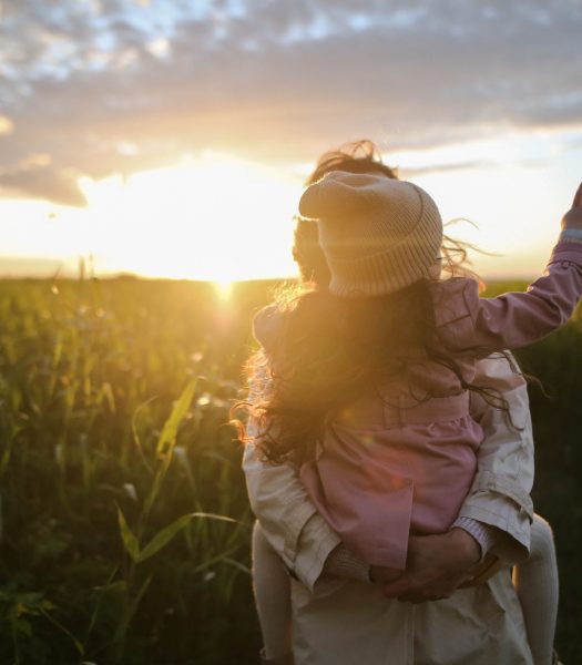 mother-and-daughter-on-grass-1683975